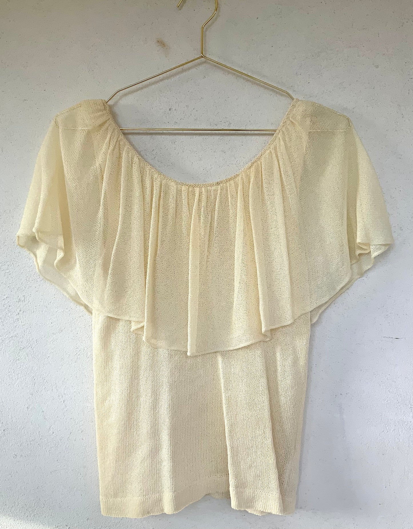 Top en maille à volant